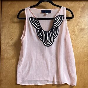Chic Sleeveless Pink Top with Black Detailing